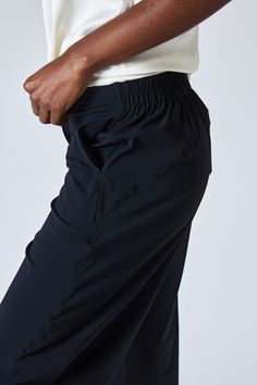 Our famous style in classic black. These pants are a standout yet comfortable pair. Style with your favorite blouse or top for an easy, everyday style. *We recommend taking one size down in this style if a closer fit is preferred. Hits above the ankle Slight stretch Relaxed fit Tapered leg Side pockets Black Comfort Stretch Pants With Pockets, Black Full Length 4-way Stretch Pants, Comfort Stretch Black Ankle-length Pants, Black Casual Yoga Pants With Minimal Stretch, Versatile Black Yoga Pants, Black Comfort Stretch Straight Leg Pants, Black Tapered Leg Pants With 4-way Stretch, Black Athleisure Pants With Slight Stretch, Black Comfort Stretch Straight Pants