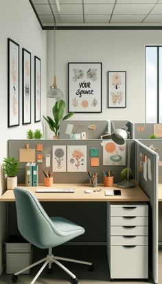 an office cubicle with desk, chair and pictures on the wall