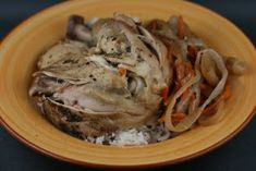 a bowl filled with food on top of a table