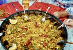 a large pan filled with food on top of a table