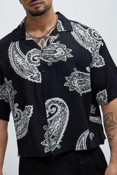 Black Short Sleeve Tops With Paisley Print, Casual Shirt With Paisley Print And Relaxed Fit, Black Short Sleeve Top With Paisley Print, Casual Collared Tops With Paisley Print, Casual White Shirt With Paisley Print, Casual Bandana Print Patterned Tops, Casual Patterned Top With Bandana Print, Patterned Paisley Print Button-up Top, Black Paisley Print Summer Top