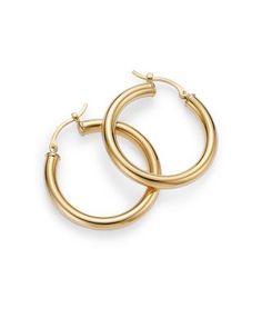 Simply chic, these 14K. yellow gold hoops are timeless classics. Tube Hoop Earrings, Simply Chic, Exclusive Jewelry, Gold Hoops, Gold Bracelet, Jewelry Accessories, Hoop Earrings, Yellow Gold, Yellow