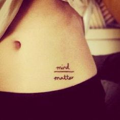 a woman's stomach with the words pinterest tattooed on her belly and an arrow