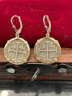 Atocha coin dangle earrings in 14kt solid gold bezel. These are absolutely beautiful earrings handmade from atocha silver bars and it comes with the certificate Silver Byzantine Pierced Earrings, Byzantine Sterling Silver Jewelry With Matching Earrings, Nickel-free Silver Earrings In 14k Gold, Nickel-free Silver 14k Gold Earrings, Nickel-free 14k Gold Silver Earrings, Nickel Free 14k Gold Silver Earrings, Traditional Silver Earrings In 14k Gold, Silver Round Byzantine Earrings, Collectible Engraved Gold Earrings