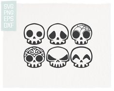 four skulls with different designs on them, one is black and the other is white