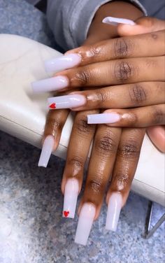 White Acrylic Nails With Small Design, All White Nails With Heart, Milky White Medium Nails, Milky White Birthday Nails, Powder White Nails With Design, Milky White Nails Red Heart, Milky White With Hearts Nails, White Nails And Red Heart, White Acrylic Nails With Heart Design