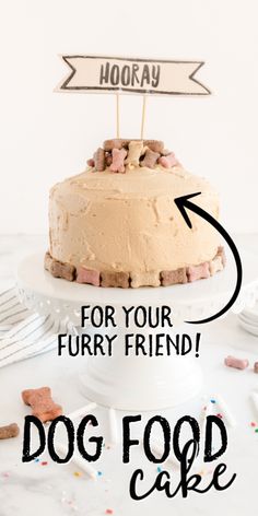 a dog food cake sitting on top of a white plate with a sign that says hooray for your furry friend