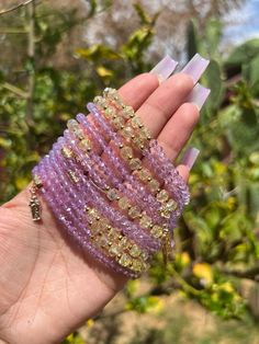 Purple beaded bracelet with San Judas charms for protection. San Judas also provides hopes in times of need. ✨ Spiritual Friendship Bracelets With Faceted Beads, Purple Beaded Crystal Bracelet For Friendship, Spiritual Wrap Bracelet With Faceted Beads As Gift, Spiritual Faceted Beads Wrap Bracelet As Gift, Spiritual Faceted Beads Friendship Bracelet, Spiritual Friendship Bracelet With Faceted Beads, Spiritual Charm Bracelet With Faceted Beads As A Gift, Hand-strung Purple Friendship Bracelets, Spiritual Beaded Charm Bracelet For Friendship