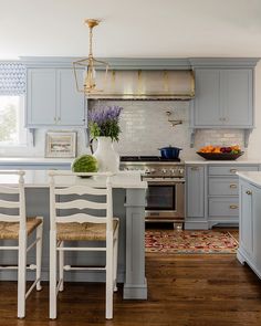 You Don’t Want to Miss This Amazing Traditional Cape Cod Home Blue Gray Kitchen Cabinets, Grey Blue Kitchen, Blue White Kitchens, Kabinet Dapur, Blue Kitchen Cabinets, Cottages And Bungalows, Blue Cabinets, Grey Kitchen Cabinets, Grey Cabinets