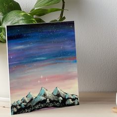 a painting of mountains with stars in the sky above them art board print on canvas