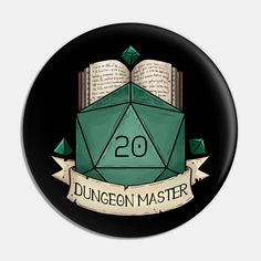 a badge with the number 20 on it and an origami cube in front