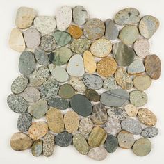 a pile of rocks sitting on top of a white surface