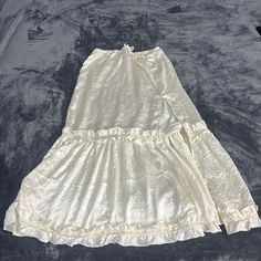 Urban Outfitters Ivory Skirt Size Small. Never Worn White Ruffled Maxi Skirt For Brunch, Cream Ruffled Long Skirt, Cream Long Ruffled Skirt, Chic Cream Maxi Skirt With Ruffles, Chic Cream Ruffled Maxi Skirt, Elegant Cream Maxi Skirt With Ruffles, Elegant Cream Skirt For Brunch, Elegant Cream Ruffled Maxi Skirt, Feminine Cream Flared Skirt Bottoms