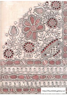 a piece of cloth with red and white designs on it