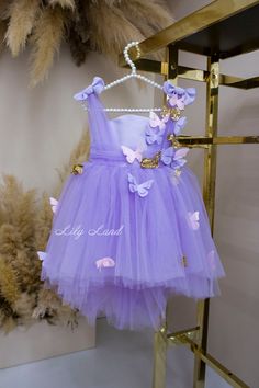 Our Lavender Butterfly Birthday Dress is the perfect choice for any special occasion. Whether you're celebrating a birthday, attending a wedding or prom, or just looking for a beautiful dress for a photoshoot, this dress is sure to impress. Featuring a delicate butterfly design on the bodice and a full tulle skirt, this dress is both elegant and playful. The soft lavender color adds a touch of sweetness, while the intricate details of the butterfly design make this dress truly unique. Perfect for flower girls, cake smash photoshoots, toddler pageants, and more, this dress is designed to make your little girl feel like a true princess. The high-quality materials and craftsmanship ensure that this dress will be a cherished item for years to come. So if you're looking for a special occasion d Gold Butterfly Birthday Party, Butterfly Birthday Dress, Toddler Pageant Dress, Toddler Pageant Dresses, Cake Smash Photoshoot, Toddler Pageant, Smash Photoshoot, Baby Birthday Dress, Lavender Butterfly