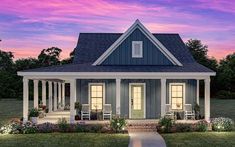 a small blue house with porches and flowers in the front yard at sunset or dawn