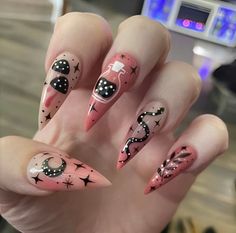 Get ready to spook up your nails this Halloween! 🎃👻💅 Check out these wickedly fun nail designs for the ultimate Halloween look. #HalloweenNails #NailArt #HalloweenInspo #SpookyNails #TrickOrTreat #NailGoals #HalloweenVibes #NailObsessed #HalloweenMakeup #NailsofInstagram 🕷️🦇🕸️ Punk Barbie Nails, Witchy Nail Art Designs, Forest Inspired Nails, Taurus Nail Art, Nail Designs Witchy, Spring Goth Nails, Mushroom Nails Acrylic, Nail Art Witch, Chola Nails Acrylic