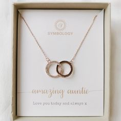 "Auntie Gift Double Circle Necklace in White Gold, Rose Gold, Gold / Interlinking Circles ChainnNecklace / Christmas Gift /  Gift For Auntie ∙ ∙ ∙ ∙ ∙  K E Y - F E A T U R E S ∙ ∙ ∙ ∙ ∙  This beautiful gift features a sparkling double circle brings a delicate and dainty yet striking pieces.  They paired with a simple and beautiful open card with space for greeting & message. They are both sentimental and stylish, making this the perfect gift for your lovely sister.  Necklace Dimensions: Charm Width: 15mm; Tag Length: 20mm; Circumference: 44-48cm Metal Type: Brass with 18K Rose Gold Plated Allergen-free, Nickel-Free, Cadmium-Free, Lead-Free From one of the SYMBOLOGY family  - Circle of Love Collection - made with love.  ∙ ∙ ∙ ∙ ∙ G I F T S ∙ ∙ ∙ ∙ ∙  Each piece is individually wrapped in a Double Circle Necklace, Rose Gold Circle, Sister Necklace, Auntie Gifts, Meaningful Jewelry, Circle Necklace, Circle Pendant, Star Pendant, Sister Gifts