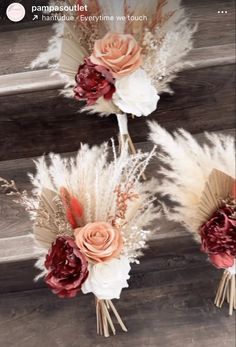 three bouquets with flowers and feathers on the bottom one is red, white and pink