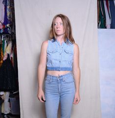 1990s light weight blue jean shirt vest MATERIAL 100% Cotton  MAKER: VB Exclusive  made in the USA CONDITION great vintage condition  buttons down the front  fake front chest pockets  SIZE 3/4 check measurements as vintage sizes are different from today item lays flat to measure double measurements for exact size no stretch to the material  pits 18 in. waist 15 in. length 16 in. model is 5'6'' bust 33in. waist 27in hips 35in. wears a dress size 3/4 SHIPPING: standard priority shipped with tracking number included we ship overseas will ship next day if requested for an additional charge. Spring Medium Wash Denim Vest, Casual Plaid Vest For Spring, Blue Denim Vest, Fitted Light Wash Summer Vest, Fitted Light Wash Vest For Summer, Y2k Blue Denim Vest For Spring, Blue Y2k Denim Vest For Spring, Fitted Cotton Denim Vest Y2k Style, Blue Y2k Style Vest For Spring