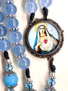 Welcome to my Shop "CREATING STILL MOMENTS."   To see all my listings and offerings, please visit my shop at  https://www.etsy.com/shop/CreatingStillMoments?ref=sh-carousel-1  semi-precious faceted blue gray agate 10 mm beads Catholic gift Blue and gray Rosary, Catholic mom gift, Catholic mother, semi-preciou beads, Confirmation gift, Catholic wedding gift, Catholic dad These rosaries are beautiful and would make a wonderful First Communion/Reconciliation or Confirmation or even wedding gift! Th Adjustable Rosary With 108 Beads As Gift, Blue Beaded Rosary As A Gift, Spiritual Blue Jewelry For Mother's Day, Mother's Day Rosary With 8mm Beads, Mother's Day Gift Rosary With 8mm Beads, Mother's Day Spiritual Rosary, Blue Spiritual Rosary As A Gift, Blue Cross Rosary For Gift, Blue Cross Rosary As Gift