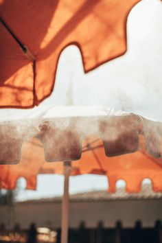 an umbrella with steam coming out of it