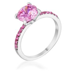 This ring is elegant and girly all at the same time with a lovely large center cubic zirconia as pink as can be. Its beautiful with many cubic zirconia accents on the band and the ring itself is fashioned with rhodium plating for a long lasting shine! Setting Type: Pave Stone Size: 8mm Stone Cut: Round Pink Wedding Rings, Gemstone Solitaire Ring, Cubic Zirconia Engagement Rings, Silver Anniversary, Pink Topaz, Pink Ring, Cz Ring, Diamond Solitaire Rings, The Band