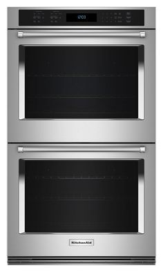 two double ovens side by side with the door open