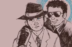 two men in hats and sunglasses sitting next to each other