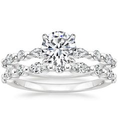 a white gold engagement ring set with diamonds