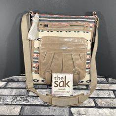 The Sak Iris Utility Crossbody Bag in Shiitake Loom NWT | eBay Beige Shoulder Bag Backpack With Cell Phone Pocket, Beige Crossbody Shoulder Bag For Travel, Beige Backpack Shoulder Bag With Cell Phone Pocket, Cream Crossbody Shoulder Bag For Travel, Khaki Crossbody Satchel For On-the-go, Cream Crossbody Shoulder Bag With Zipper Pocket, Sak Purses Leather Handbags, The Sak Crochet Bag, Practical Crossbody Shoulder Bag With Anti-theft Pocket