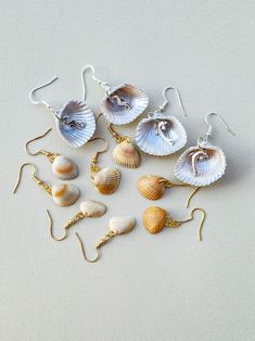 These are dangle earrings made REAL seashells, with the metal components made of a high-quality zinc alloy that is strong, lightweight, and durable. Please select which set of earrings you would like to purchase. Shell Earrings Diy Seashell Jewelry, Shells Earrings, Diy Earrings Polymer Clay, Diy Jewelry Display, Earrings Beach, Shell Crafts Diy, Seashell Earrings, Jewelry Making Earrings, Resin Jewellery