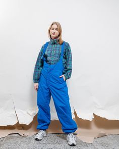 "Vintage 80s solid blue relaxed suspender winter ski pants. Size M/L Waist measures 33in and inside leg 31in. No inside size or material labels. Model usually wears size XS, 171 cm - 5'7\". Great condition, keep in mind that it is vintage item and signs of natural wear/age might appear. If you have any questions about item don't hesitate to message us.  When buying from HungerVintage you support small sustainable bussiness.  Thank you!  Orders over 50 are shipped in reusable compostable mailers. Casual Blue Skiing Bottoms, Blue Skiing Bottoms For Winter, Reversible Vest, Ski Suits, Ski Pants, Flowy Tops, Snow Suit, Long Sleeve Tunic, Vintage Sweaters