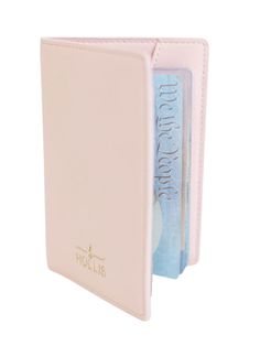 a pink leather wallet with two credit cards in it