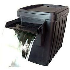 a black toilet paper dispenser on a white background