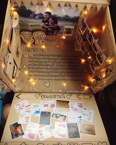 an open suitcase filled with pictures and lights