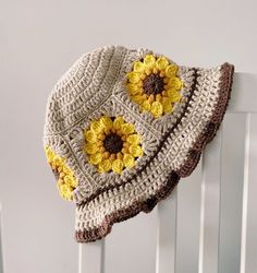 THIS IS A PDF DIGITAL CROCHET PATTERN not a finished product! If you are a crocheter who has been wanting make one of the cutest sunflower bucker hats around ,then finally due to popular demand I have made this pattern for you! Recently crochet hats have been so trendy and popular and this particular sunflower design has been super popular! The pattern is written in US crochet terms and is suitable for an upper beginner level and upwards. Use up your stash as this hat pattern only uses between 1 Sunflower Bucket Hat Crochet, Sunflower Bucket, Crochet Baby Cap, Crochet Summer Hats, Crochet Mignon, Confection Au Crochet, Crocheted Hat, Bonnet Crochet, Crochet Bucket Hat