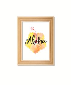 the word aloha is painted in watercolor and framed on a white wall