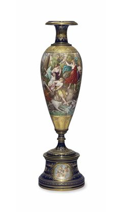 an ornate vase with paintings on it