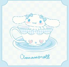 a cartoon cat sitting in a teacup with the word cinnamon on it