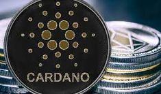 a coin with the word cardanoo written on it next to stacks of coins