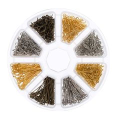 various types of pins and needles in a plastic container