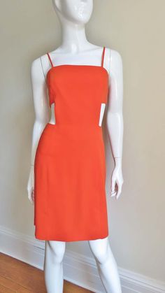 Orange Spaghetti Straps Evening Dress, Orange Backless Evening Dress, Orange Spaghetti Strap Lined Dress, Orange Fitted Dress With Straight Neckline, Chic Orange Square Neck Dress, Orange Cutout Dress For Party, Thierry Mugler Dress, Orange Cutout Dress, Mugler Dress