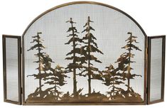 an iron fireplace screen with pine trees and birds on the tree tops in gold, set against a white background