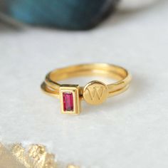 "Know someone with an July birthday ~ this is the perfect gift! Stackable birthstone rings are the IT accessory. Wear by itself or pair with with an initial ring! This listing is for one 24K gold vermeil stackable birthstone ring with a Swarovski crystal (please see color chart for color selection). Round, square, or rectangle stone settings are available. Want more rings or a different month? Build Your Own Gold Stackable Ring listing: https://www.etsy.com/listing/250020772 Also, available in S Mothers Ring Stackable, Ring For Mom, Custom Birthstone Ring, Christmas Jewelry Gift, Stackable Birthstone Rings, Rings Dainty, Birthstone Stacking Rings, July Birthstone Ring, Multiple Rings