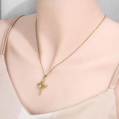 Illuminating Rhinestone Accents The cross pendant is adorned with sparkling rhinestones that catch the light with every movement, adding a dazzling touch of glamour. Whether worn for everyday elegance or special occasions, the rhinestones bring brilliance and sophistication to your style. Hypoallergenic Stainless Steel Chain The necklace is paired with a durable stainless steel chain that resists tarnishing and is hypoallergenic, making it ideal for sensitive skin. The chain ensures long-lasting wear and a comfortable fit, allowing you to enjoy this piece without worry. Versatile Layering Piece Not only does this cross with crown necklace stand out as a statement piece on its own, but it also pairs beautifully with other necklaces for a fashionable, layered look. Its versatility makes it a Gold Cubic Zirconia Cross Necklace, Elegant Rhinestone Cross Necklace On Clavicle Chain, Elegant Rhinestone Cross Clavicle Necklace, Elegant Cubic Zirconia Cross Necklace With Clavicle Chain, Elegant Rhinestone Cross Pendant Clavicle Necklace, Cross Shaped Rhinestone Necklace Gift, Diamond Cross Jewelry With Rhinestones, Cross-shaped Diamond Jewelry With Rhinestones, Elegant Cubic Zirconia Cross Pendant Necklace