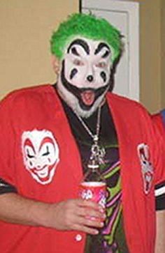 two men dressed in clown makeup and green hair