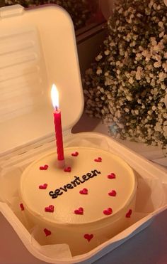 a small birthday cake with a candle in it