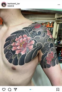 a man with a flower tattoo on his chest