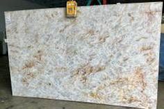 a white marble slab sitting on top of a floor